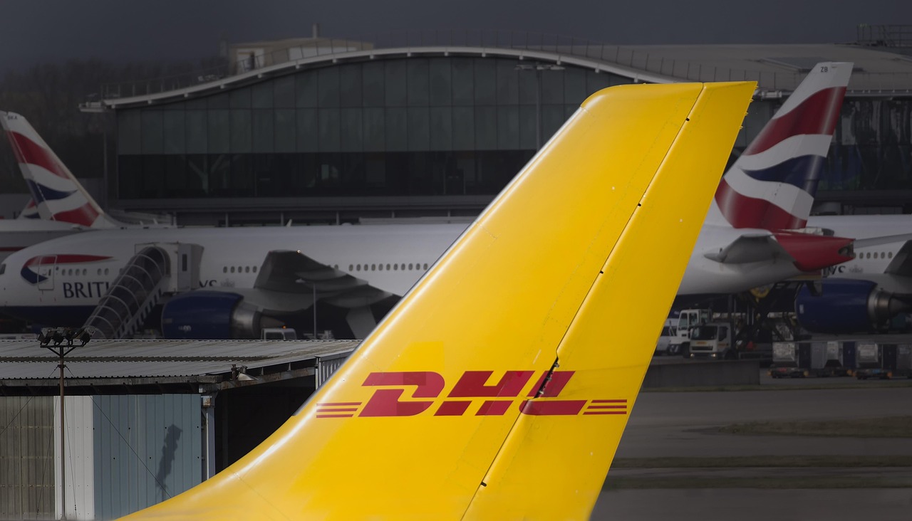 portfolio-05 dhl, freight, cargo, airline, airplane, aviation, transport, mail, shipment, delivery, yellow, transporting service, parcel service, parcel delivery, delivering package, logistics technology, logistics, delivery of cargo, logistics transport, freight transportation, dhl, dhl, dhl, dhl, dhl, cargo, delivery, logistics